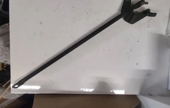 Radiator support slam panel bracket