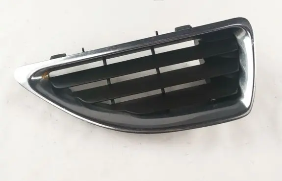 Renault Megane I Front bumper upper radiator grill 7700428964
