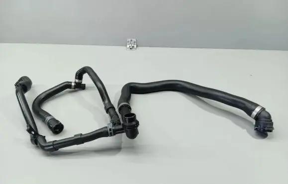 Volkswagen PASSAT Engine coolant pipe/hose 5Q0121619D