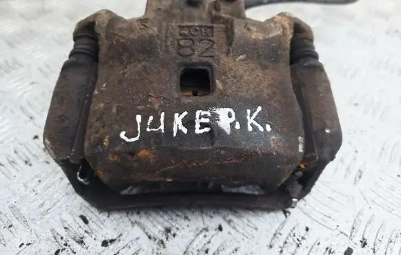 Nissan Juke I F15 Front brake caliper