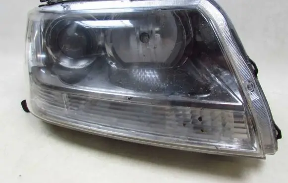 Suzuki Grand Vitara II Headlight/headlamp 10059079