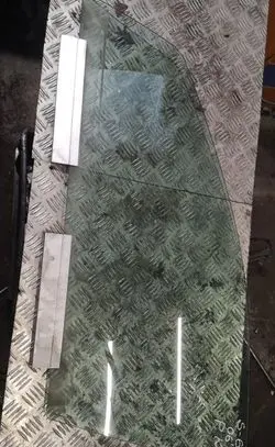 Volvo S60 Front door window glass four-door
