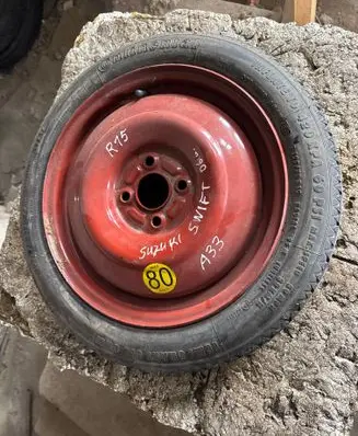 Suzuki Swift I R15 spare wheel 