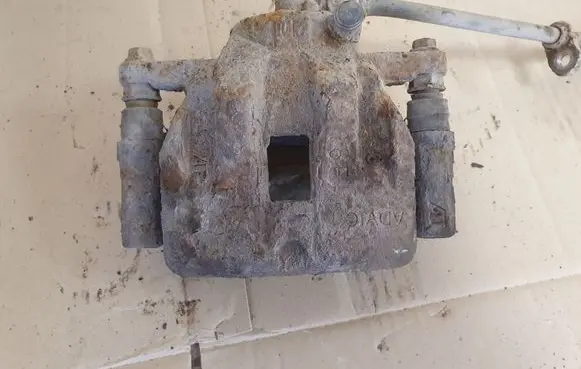 Suzuki Grand Vitara II Front brake caliper