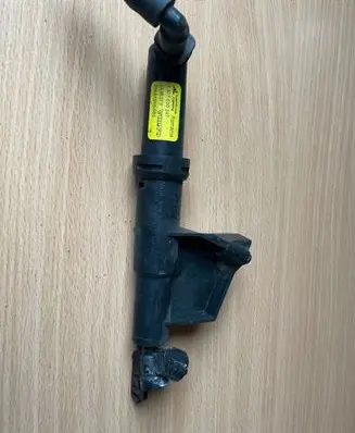 Headlight washer spray nozzle