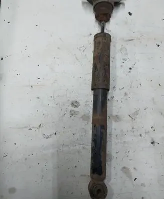 Volkswagen Touran I Rear shock absorber/damper 1T0512011