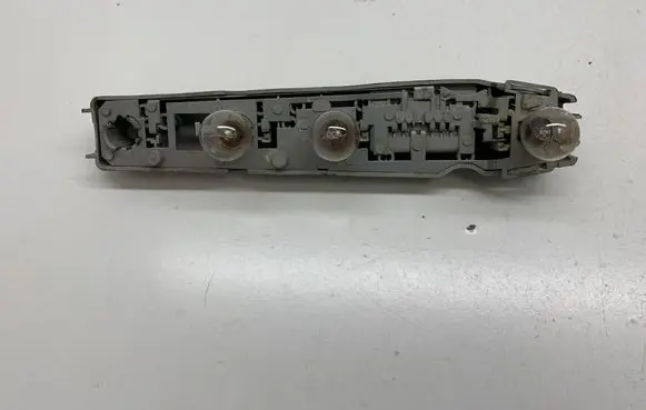 Ford Escort Tail light bulb cover holder 91AG13N004