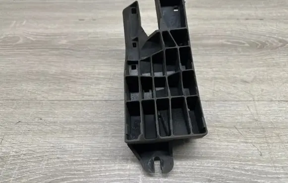 Radiator support slam panel bracket