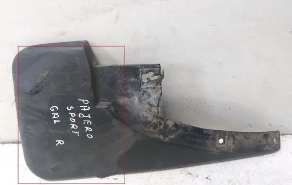 Mitsubishi Pajero Sport I Rear mudguard MR230946