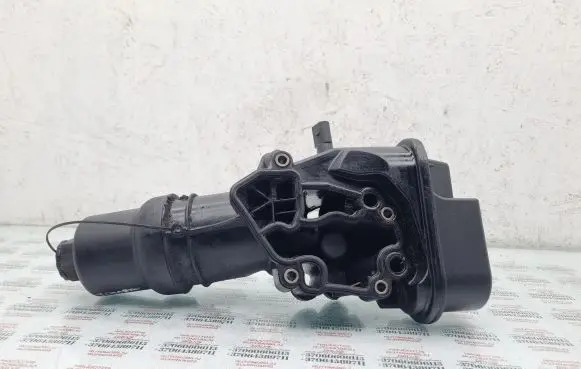 Volkswagen Touran II Oil filter mounting bracket 06F115397H