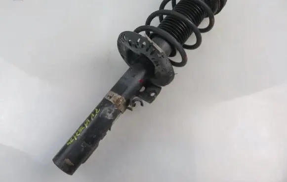Volkswagen Fox Front shock absorber with coil spring