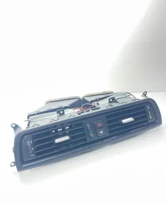Dash center air vent grill