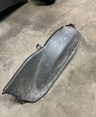 Trunk/boot lower side trim panel