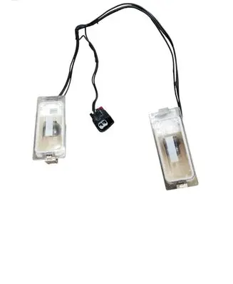 Lancia Voyager Number plate light 68028050AA 68028050AB