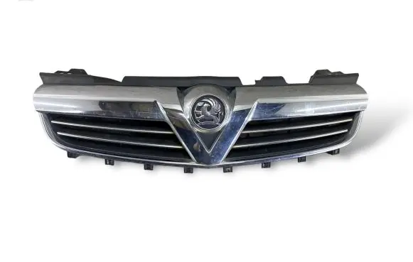 Opel Zafira B Front bumper upper radiator grill 13247331