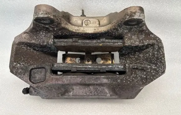 Volkswagen Touareg I Front brake caliper 209286052A