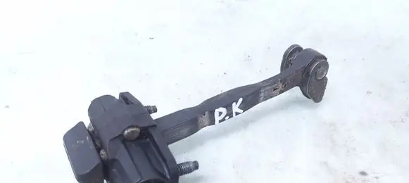 Front door check strap stopper