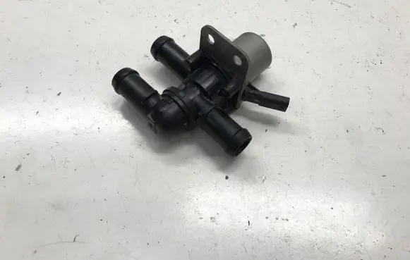 Coolant heater control valve