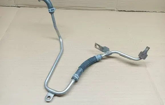 Volkswagen Golf VII Fuel line pipe 04L131582B