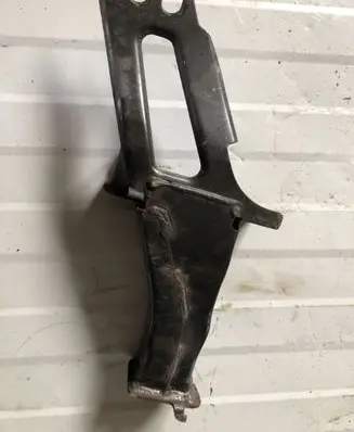 Radiator support slam panel bracket