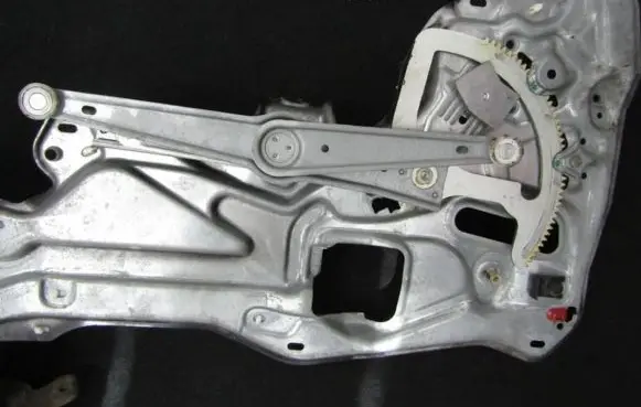 Renault Laguna I Sliding door window regulator with motor 7701672409