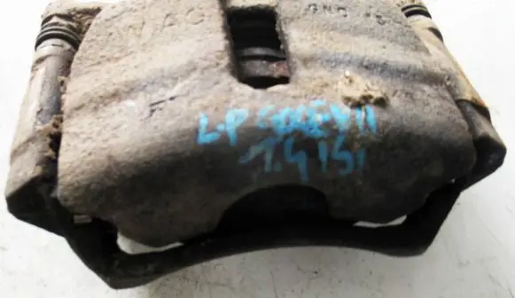 Volkswagen Golf VII Front brake caliper