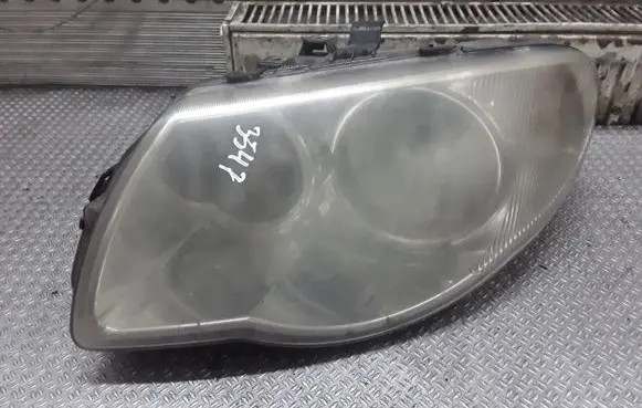 Chrysler Grand Voyager IV Headlight/headlamp 04857831AC