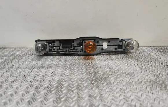 Nissan Micra Tail light bulb cover holder 26554AX720