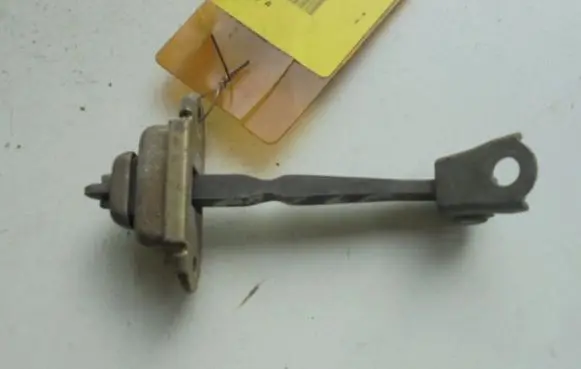 Nissan Primera Front door check strap stopper 