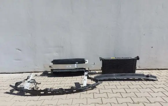 Radiator support slam panel