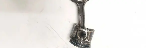 Opel Corsa D Piston with connecting rod 73502643