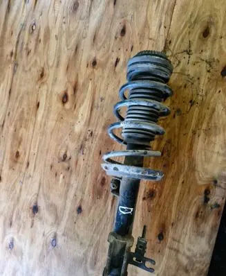 Opel Astra H Front shock absorber with coil spring