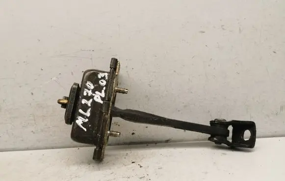 Front door check strap stopper