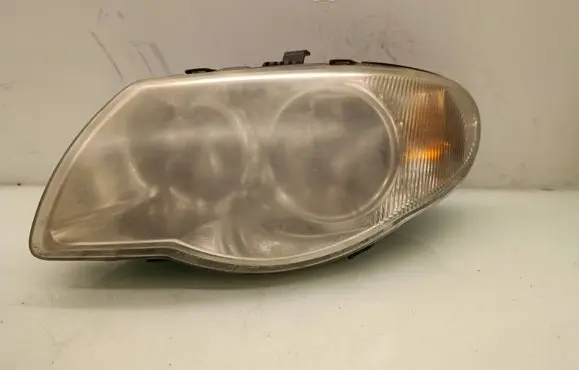 Chrysler Voyager Headlight/headlamp 04857831AC