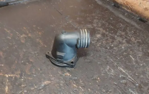 Thermostat/thermostat housing