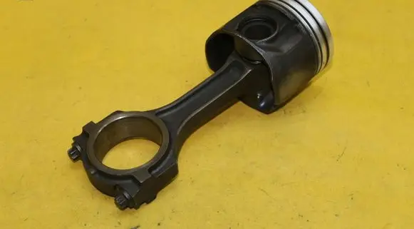 Piston with connecting rod