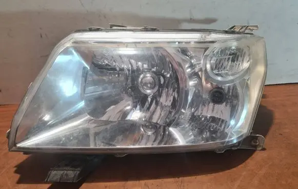 Suzuki Grand Vitara II Headlight/headlamp 10059076