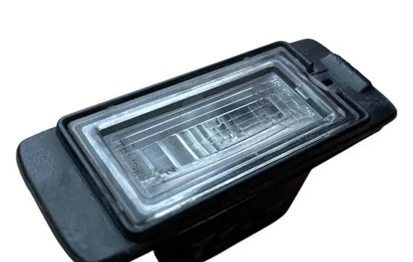 Opel Astra J Number plate light 13578958