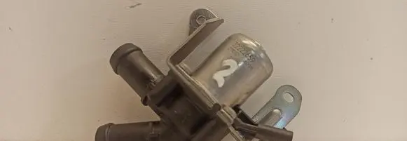 Coolant heater control valve