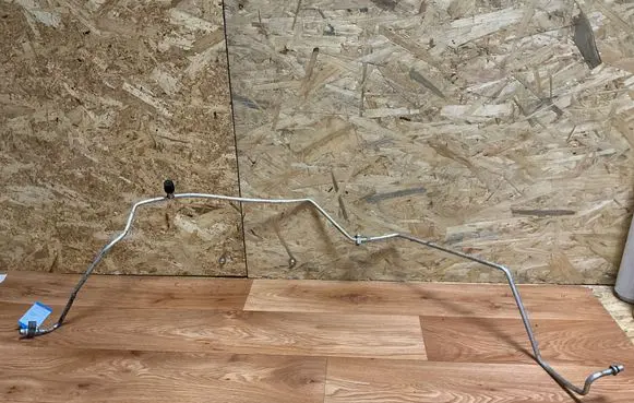 Nissan Almera Tino Air conditioning (A/C) pipe/hose 021104RB ACH87S