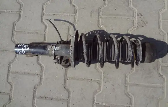 Skoda Fabia Mk2 (5J) Front shock absorber with coil spring