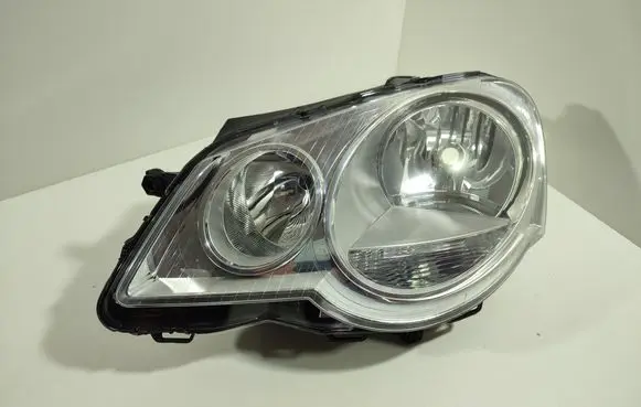 Volkswagen Polo IV 9N3 Headlight/headlamp 89311999