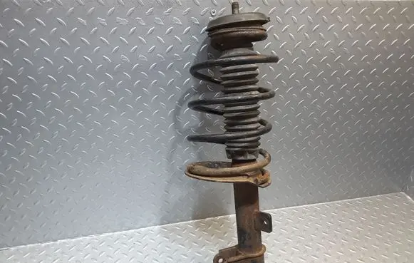 Citroen C4 I Front shock absorber with coil spring