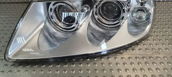 Volkswagen Touareg I Headlight/headlamp 7L6941015BK