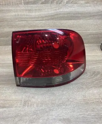 Volkswagen Touareg I Tailgate rear/tail lights 7L6945096K