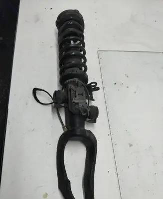 Front shock absorber with coil spring