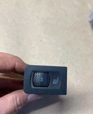 Seat heating switch