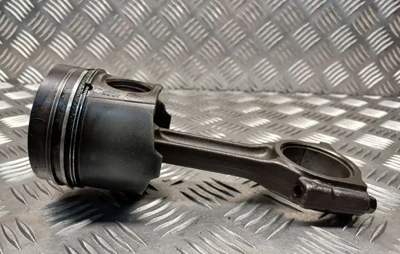 Piston with connecting rod