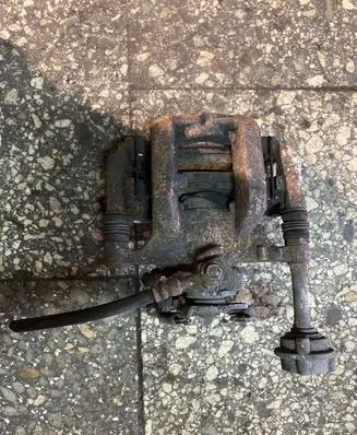 Opel Astra J Rear brake caliper