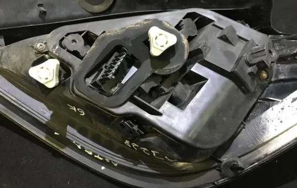 Opel Astra H Tail light bulb cover holder
